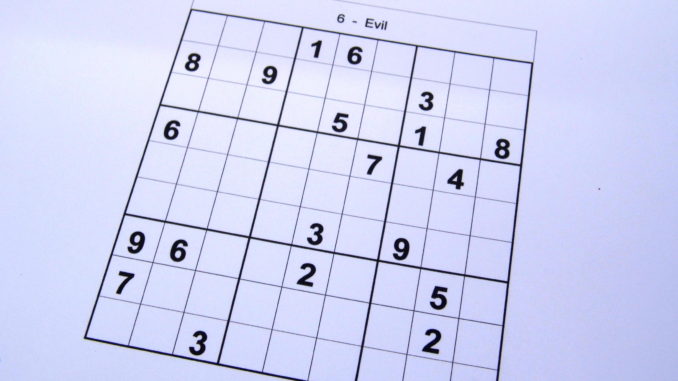 Evil level sudoku puzzle book at the start