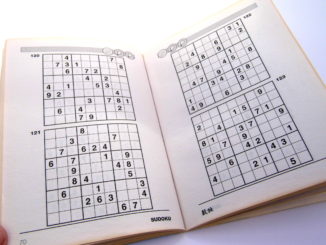 Sudoku puzzle book on page 70